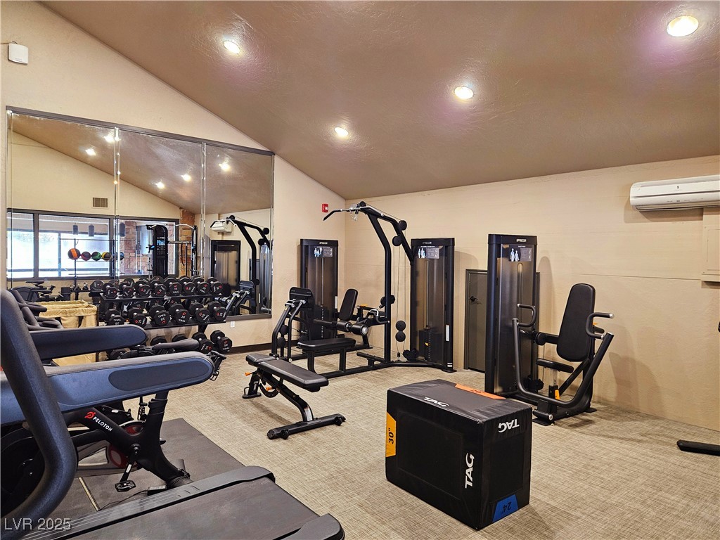 223 Hunter Ridge Drive, Unit 2303 Brian Head, UT 84719 - Photo 23 of 31 Gym featuring lofted ceiling, recessed lighting, and a wall mounted AC
