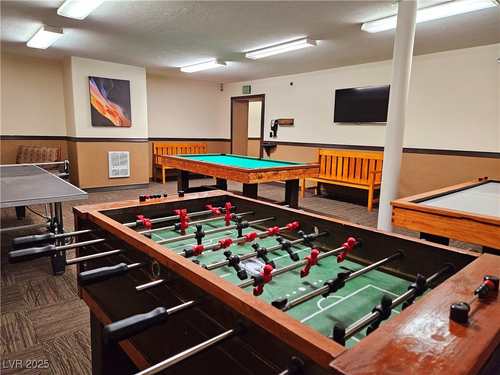 223 Hunter Ridge Drive, Unit 2303 Brian Head, UT 84719 - Photo 25 of 31 Game room with a textured ceiling, heating unit, and pool table