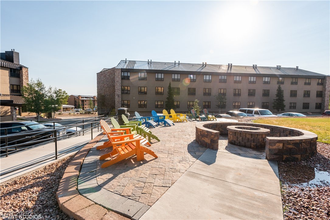 223 Hunter Ridge Drive, Unit 2303 Brian Head, UT 84719 - Photo 30 of 31 View of patio featuring an outdoor fire pit
