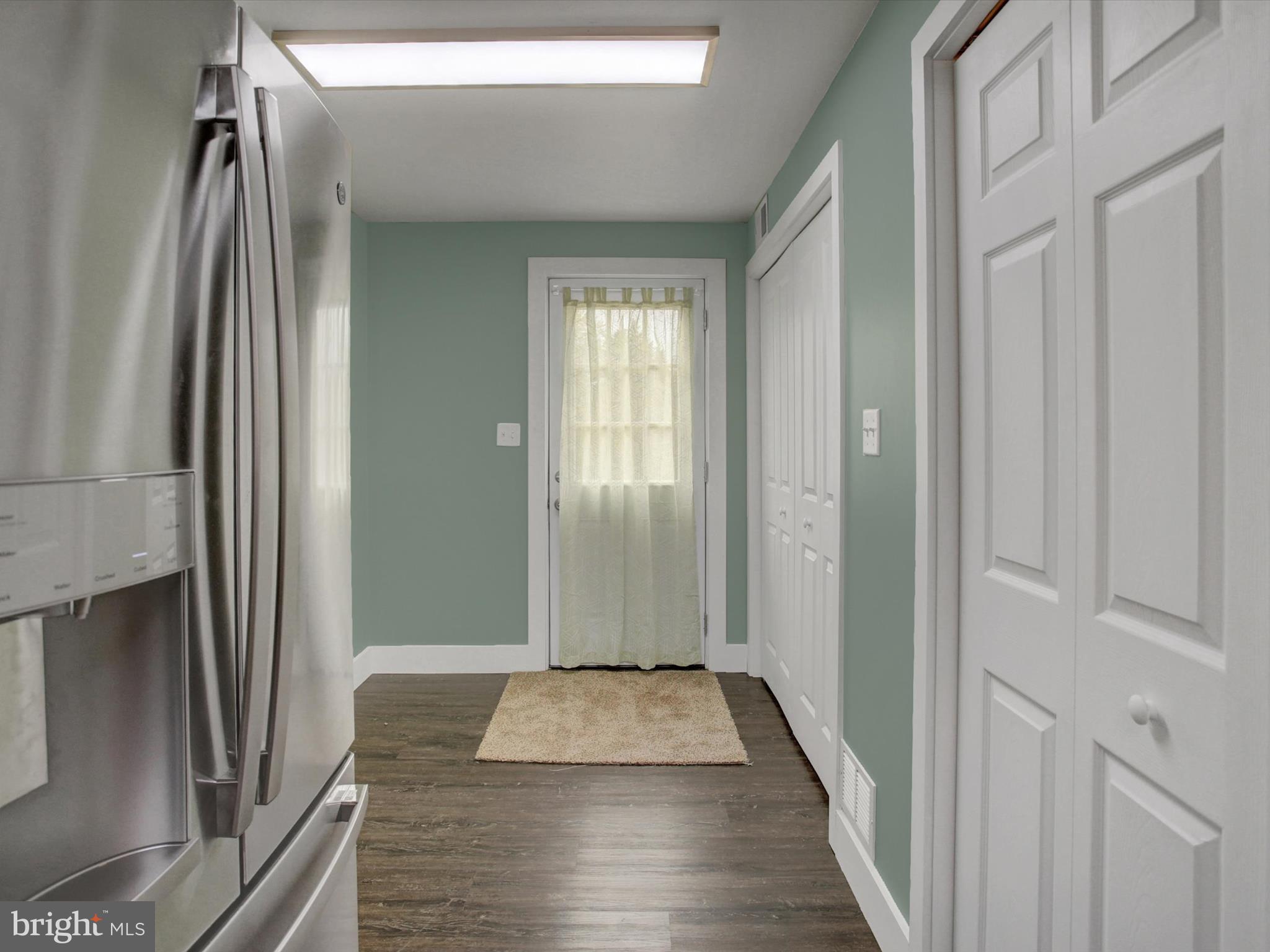 3043 Emmitsburg Road Gettysburg, PA 17325 - Photo 15 of 48 a view of a hallway with wooden floor and staircase