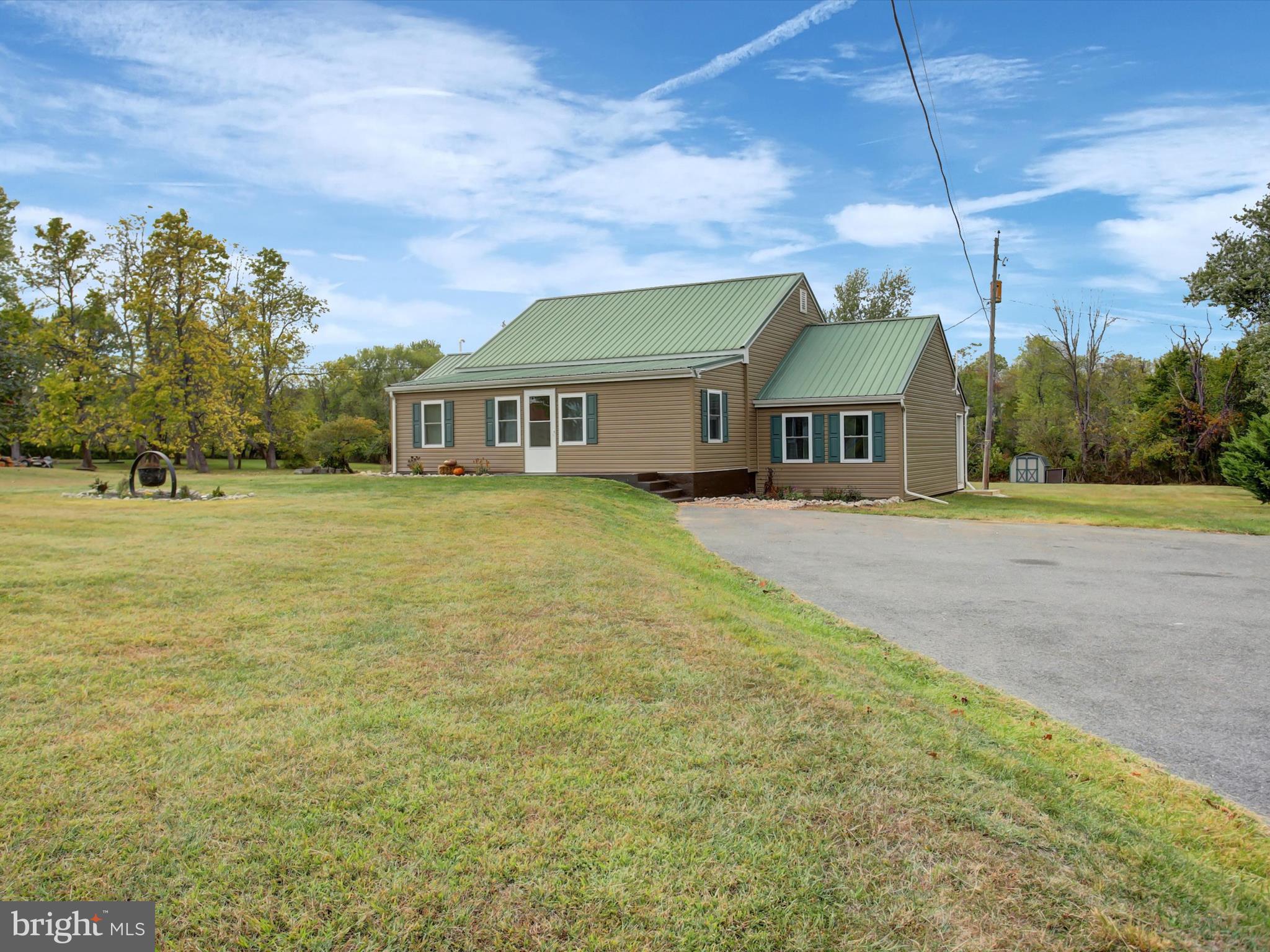 3043 Emmitsburg Road Gettysburg, PA 17325 - Photo 2 of 48 a view of a house with a big yard and large trees