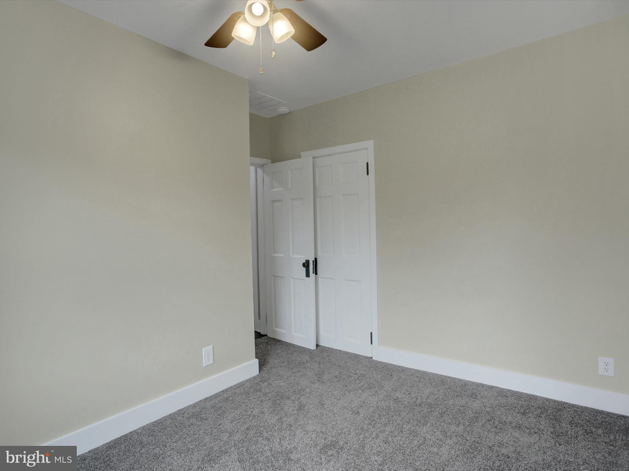 3043 Emmitsburg Road Gettysburg, PA 17325 - Photo 34 of 48 an empty room with a chandelier fan