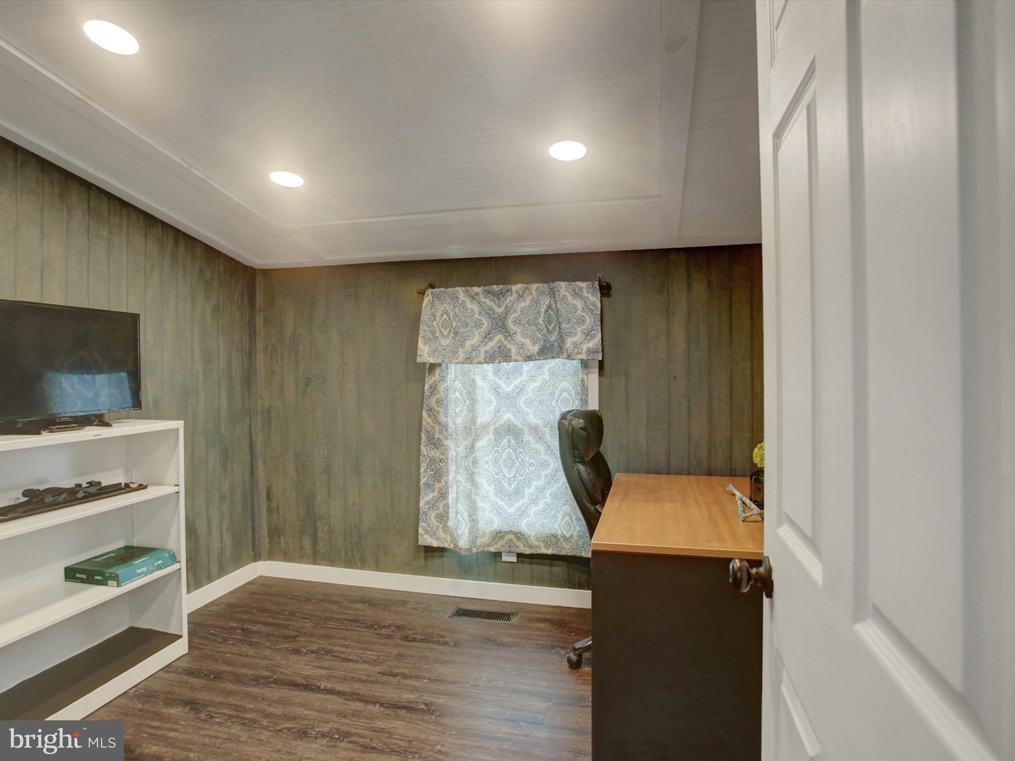 3043 Emmitsburg Road Gettysburg, PA 17325 - Photo 35 of 48 a view of room with window and flat screen tv