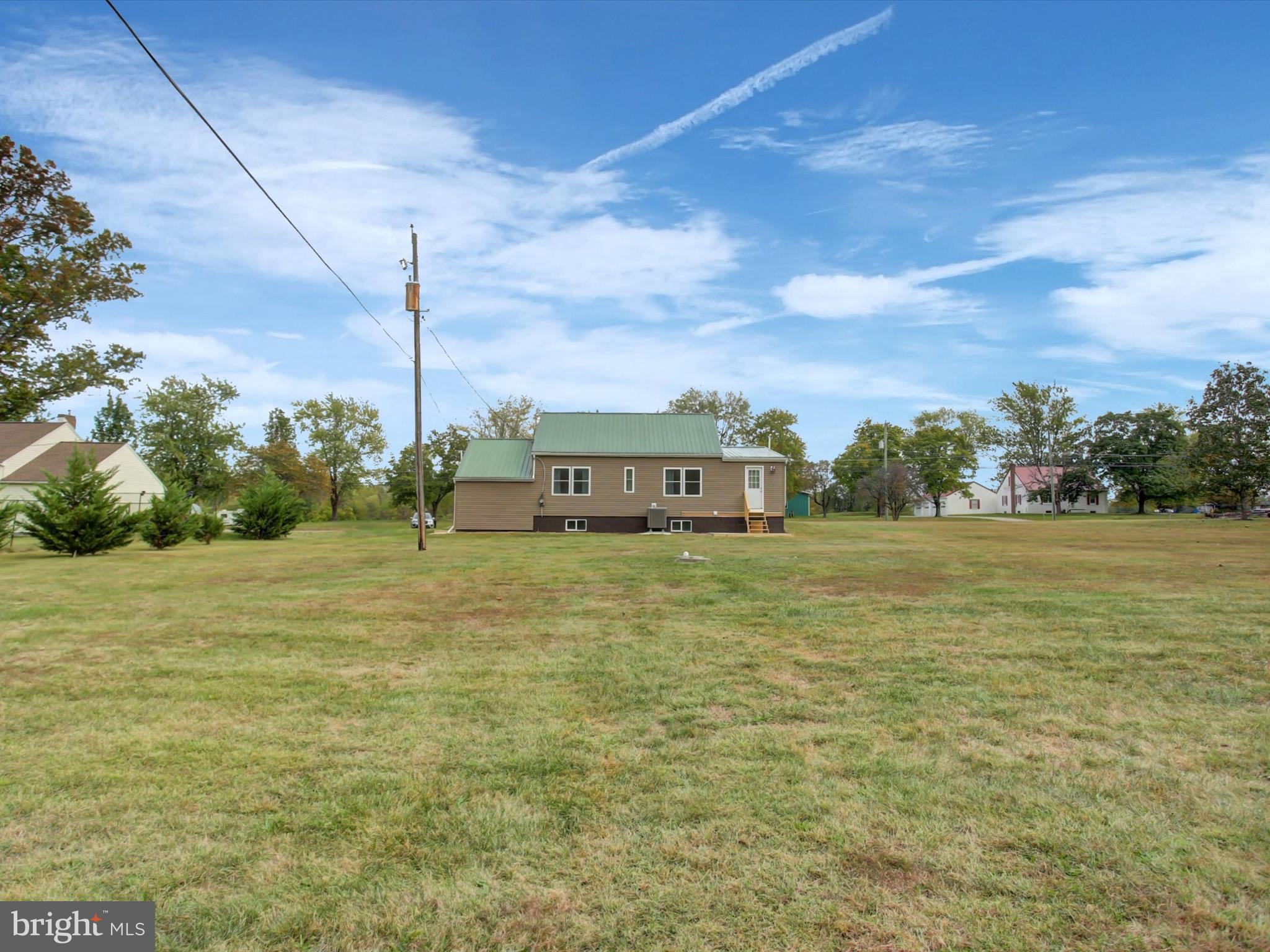 3043 Emmitsburg Road Gettysburg, PA 17325 - Photo 4 of 48 a front view of a house with a yard