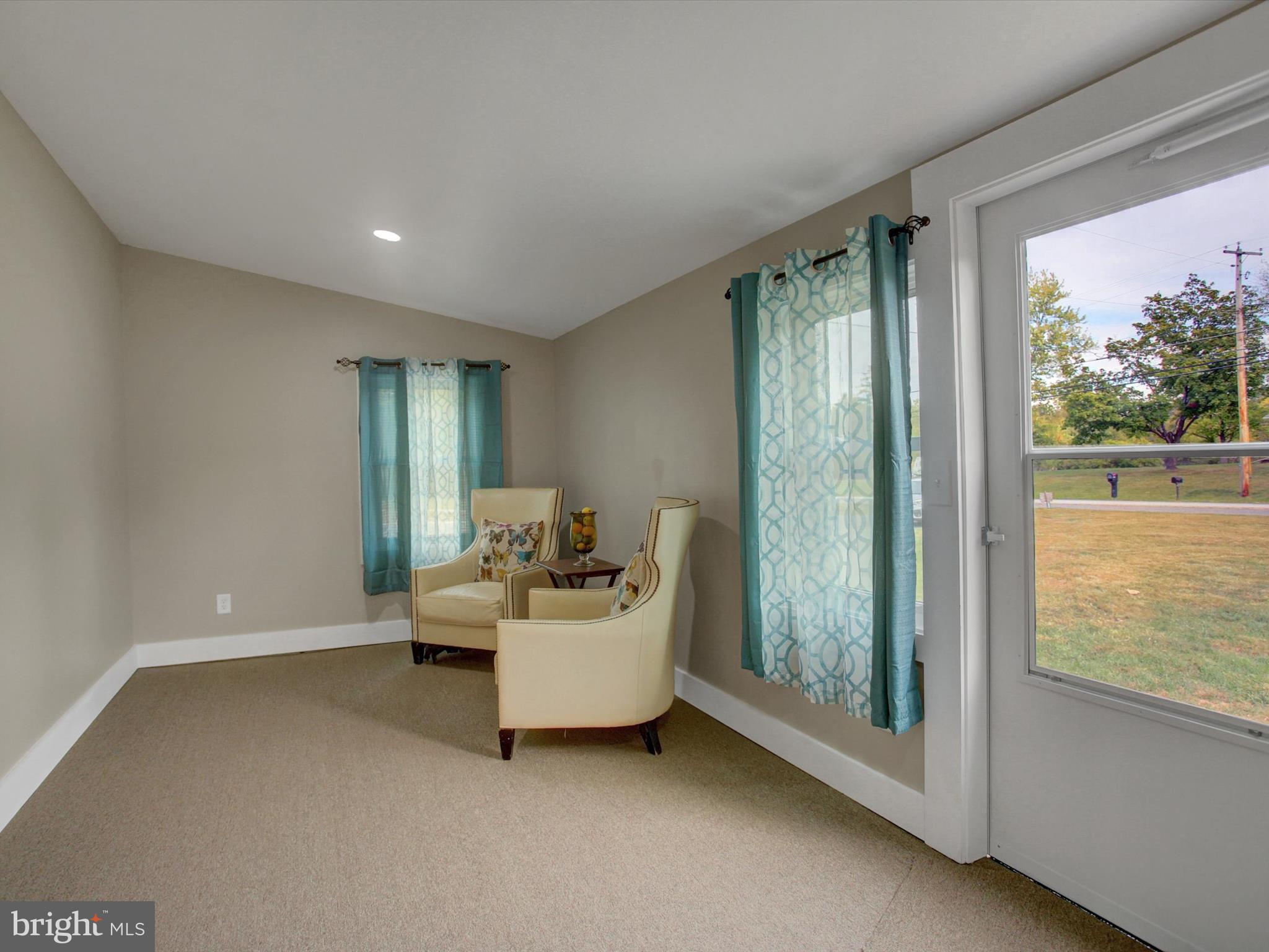 3043 Emmitsburg Road Gettysburg, PA 17325 - Photo 5 of 48 a living room with furniture and a large window