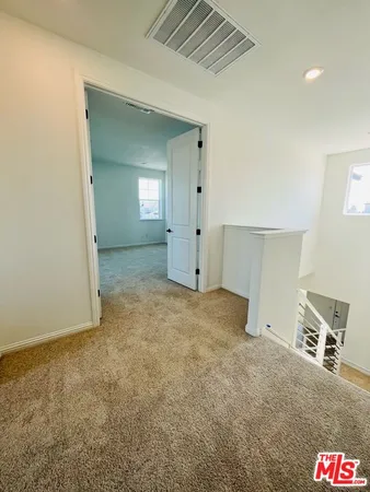 a bathroom with a sink toilet a mirror and shower