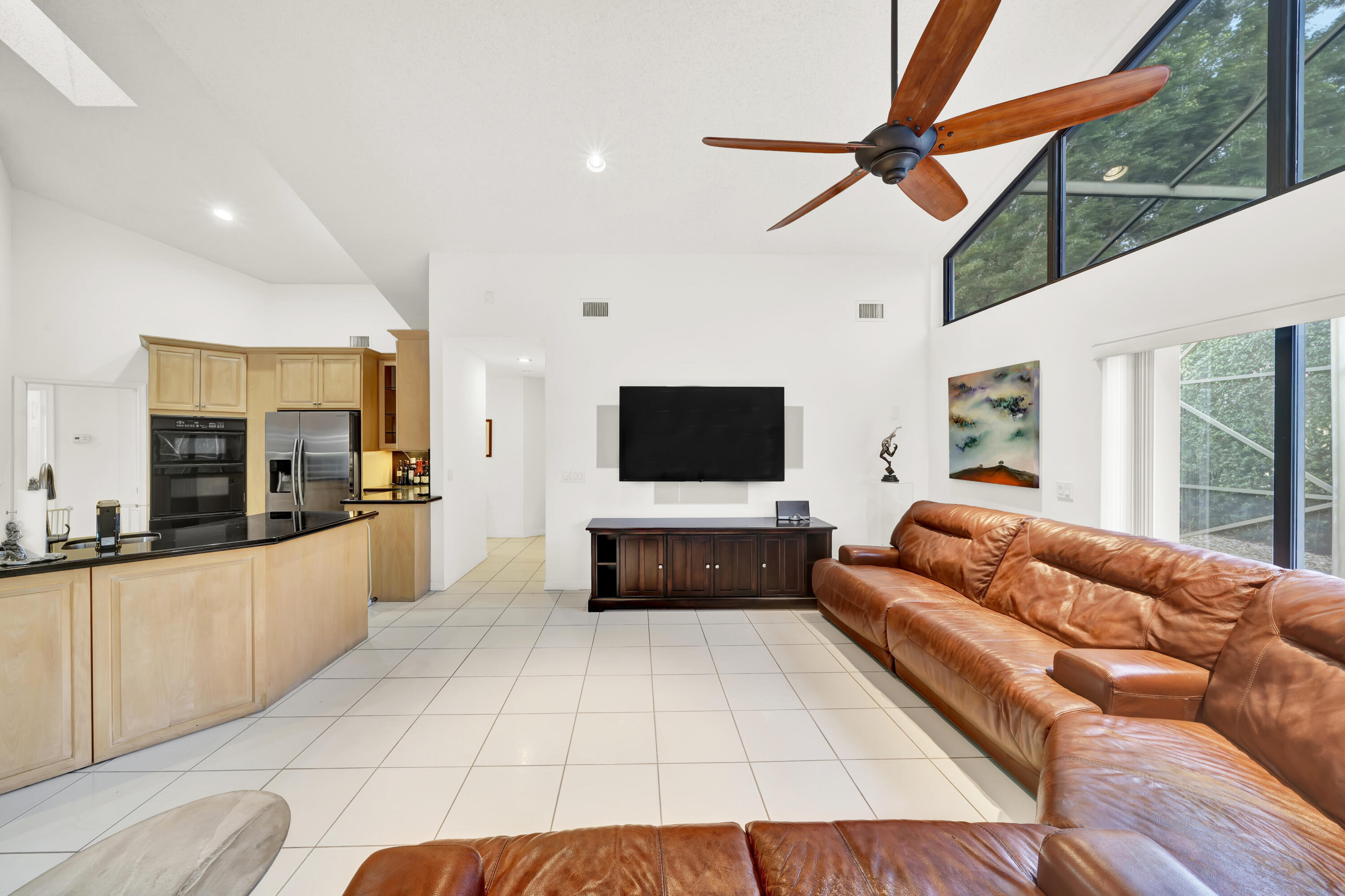 20513 Sausalito Drive Boca Raton, FL 33498 - Photo 13 of 39 a living room with furniture and a flat screen tv