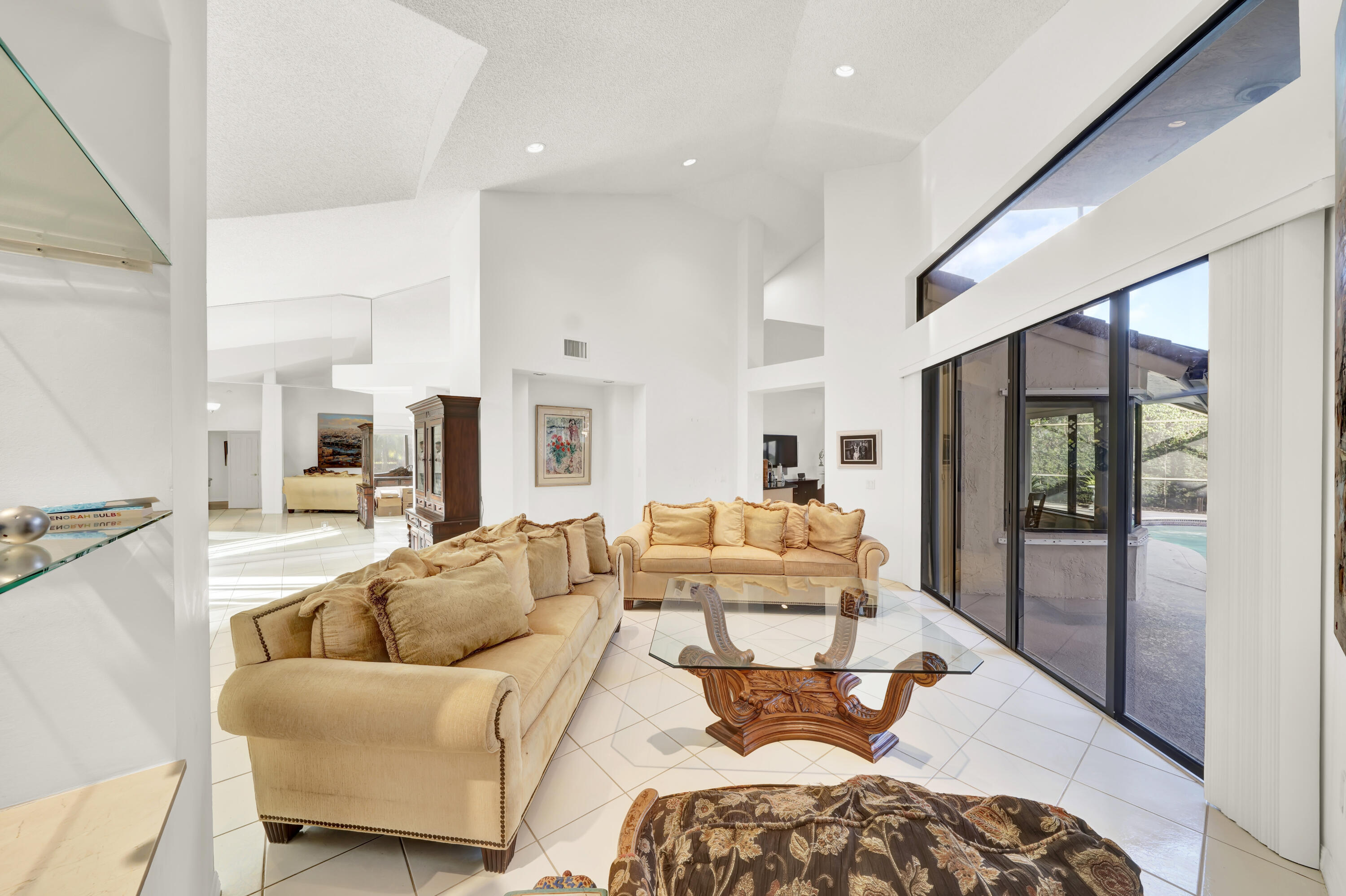 20513 Sausalito Drive Boca Raton, FL 33498 - Photo 16 of 39 a living room with furniture and a large window