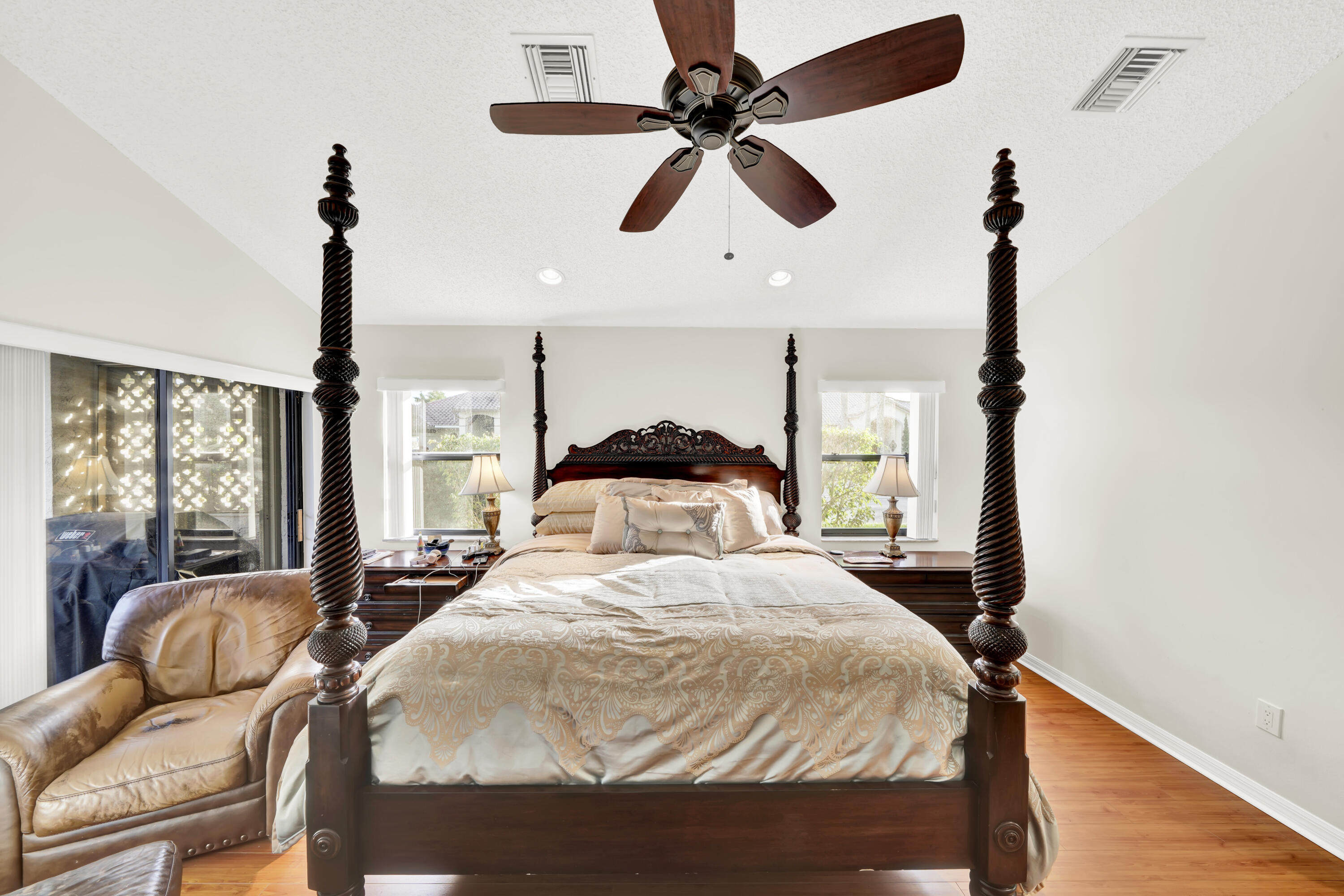 20513 Sausalito Drive Boca Raton, FL 33498 - Photo 29 of 39 a bedroom with a bed mirror and window