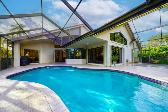 a view of swimming pool with a patio