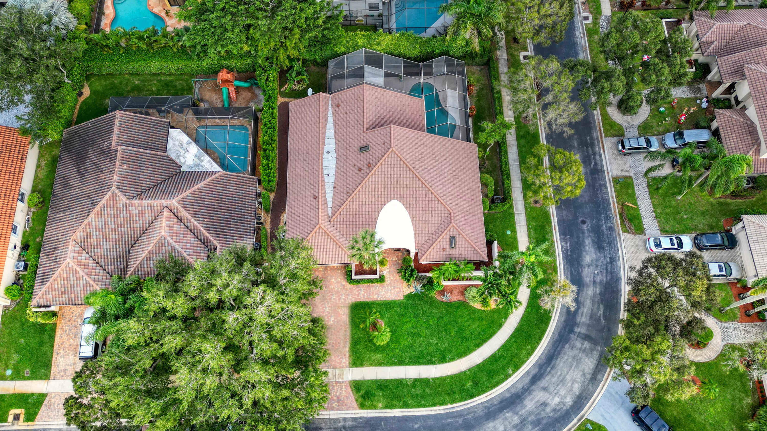 20513 Sausalito Drive Boca Raton, FL 33498 - Photo 37 of 39 an aerial view of a house with a garden and large trees
