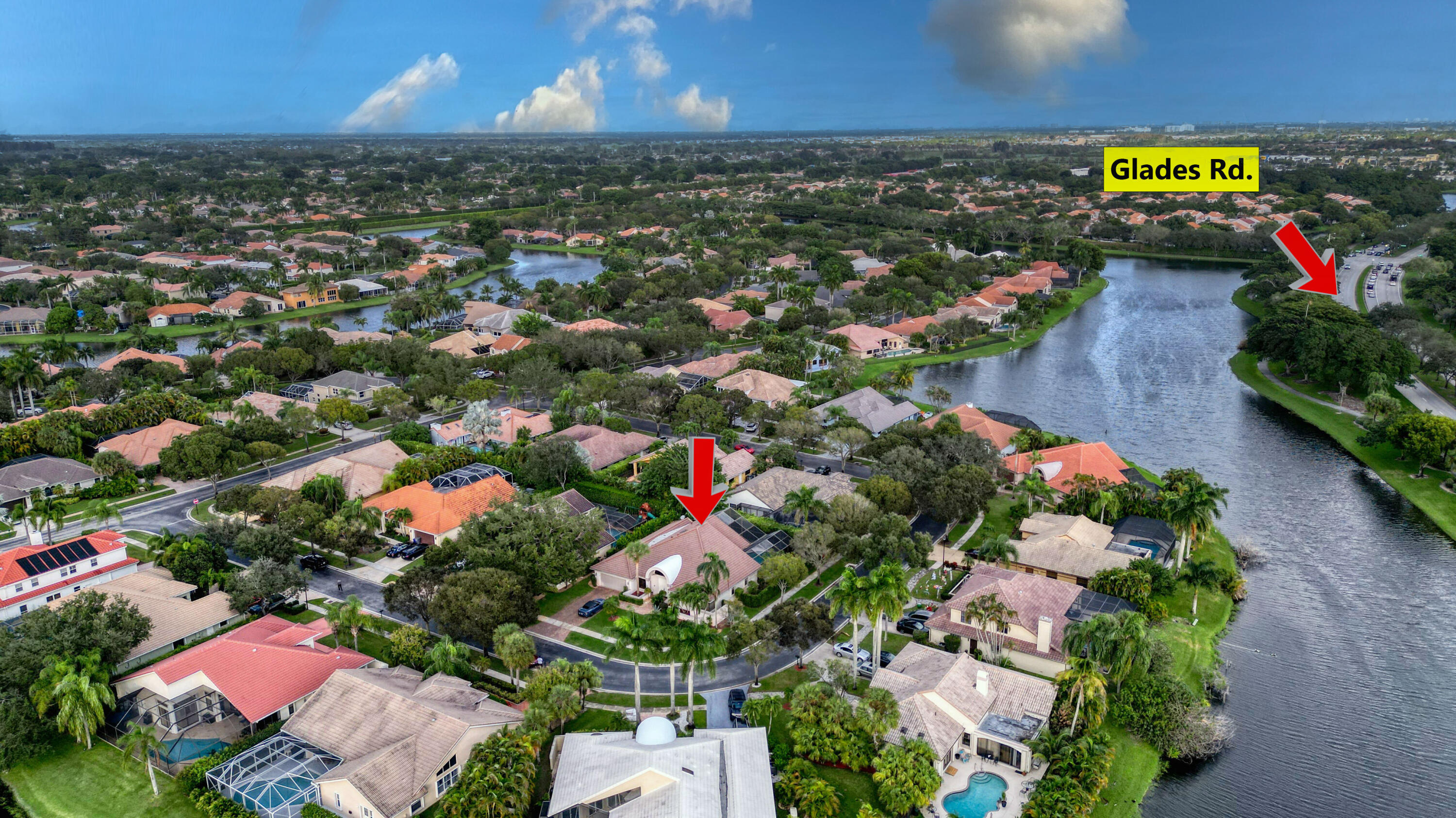 20513 Sausalito Drive Boca Raton, FL 33498 - Photo 38 of 39 an aerial view of a houses with a lake