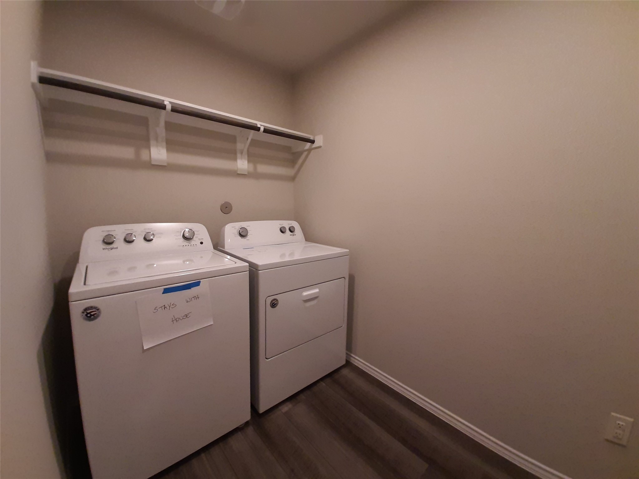 9257 Inland Leather Lane Conroe, TX 77385 - Photo 20 of 28 a utility room with dryer and washer