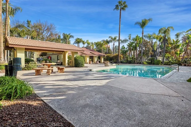a view of a street with houses on both side