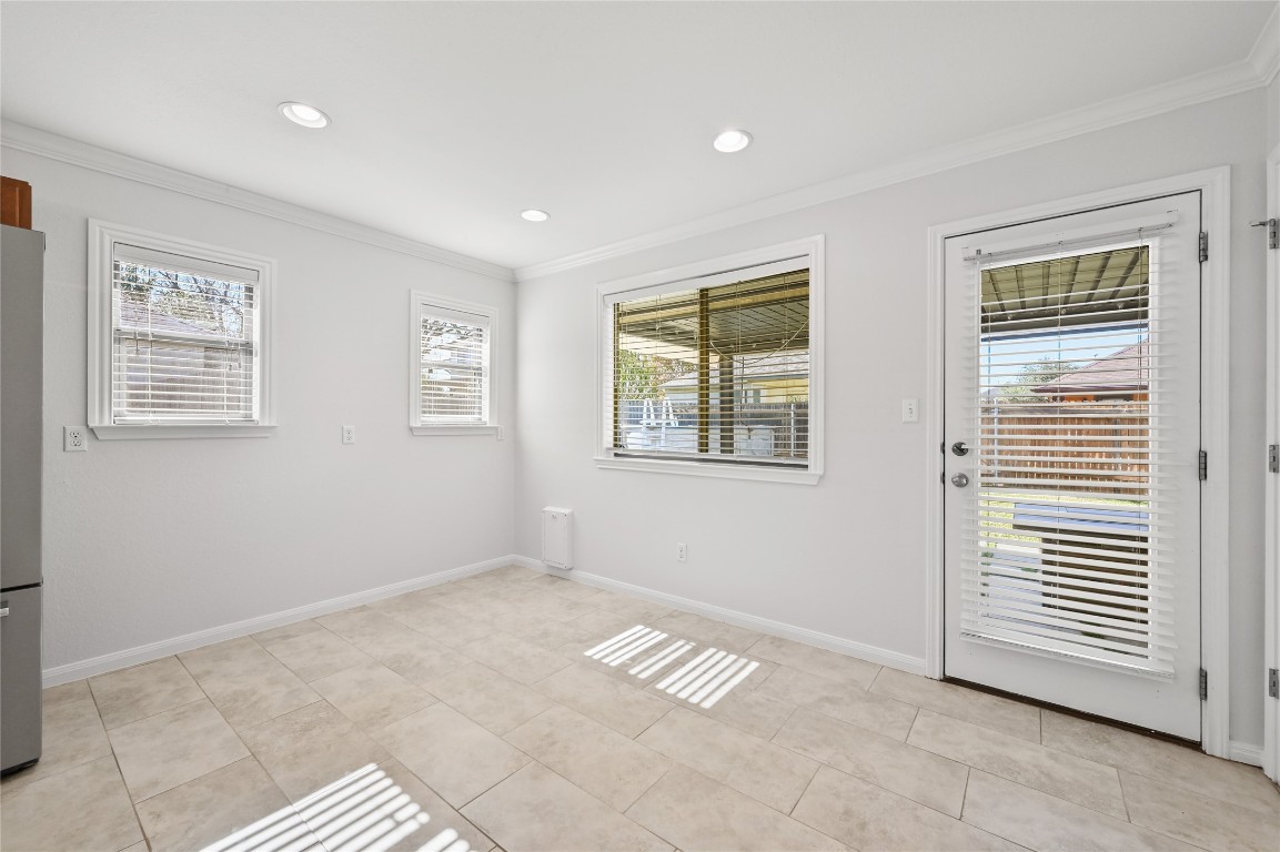 6909 Bay City Bend Austin, TX 78725 - Photo 19 of 37 a view of an empty room with a window