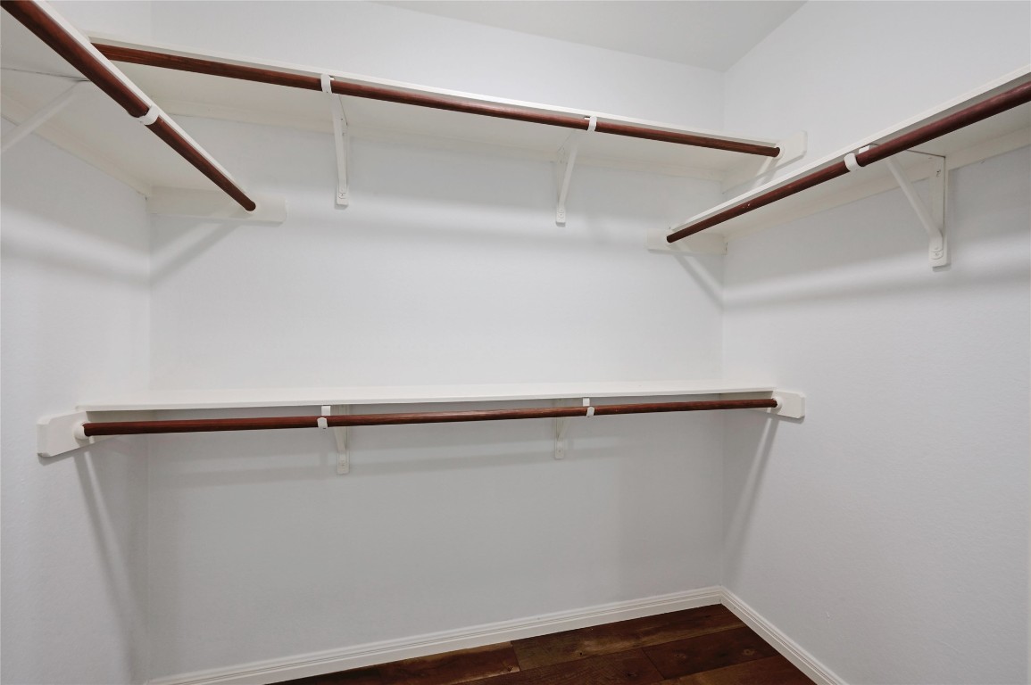 6909 Bay City Bend Austin, TX 78725 - Photo 22 of 37 a view of an empty walk in closet