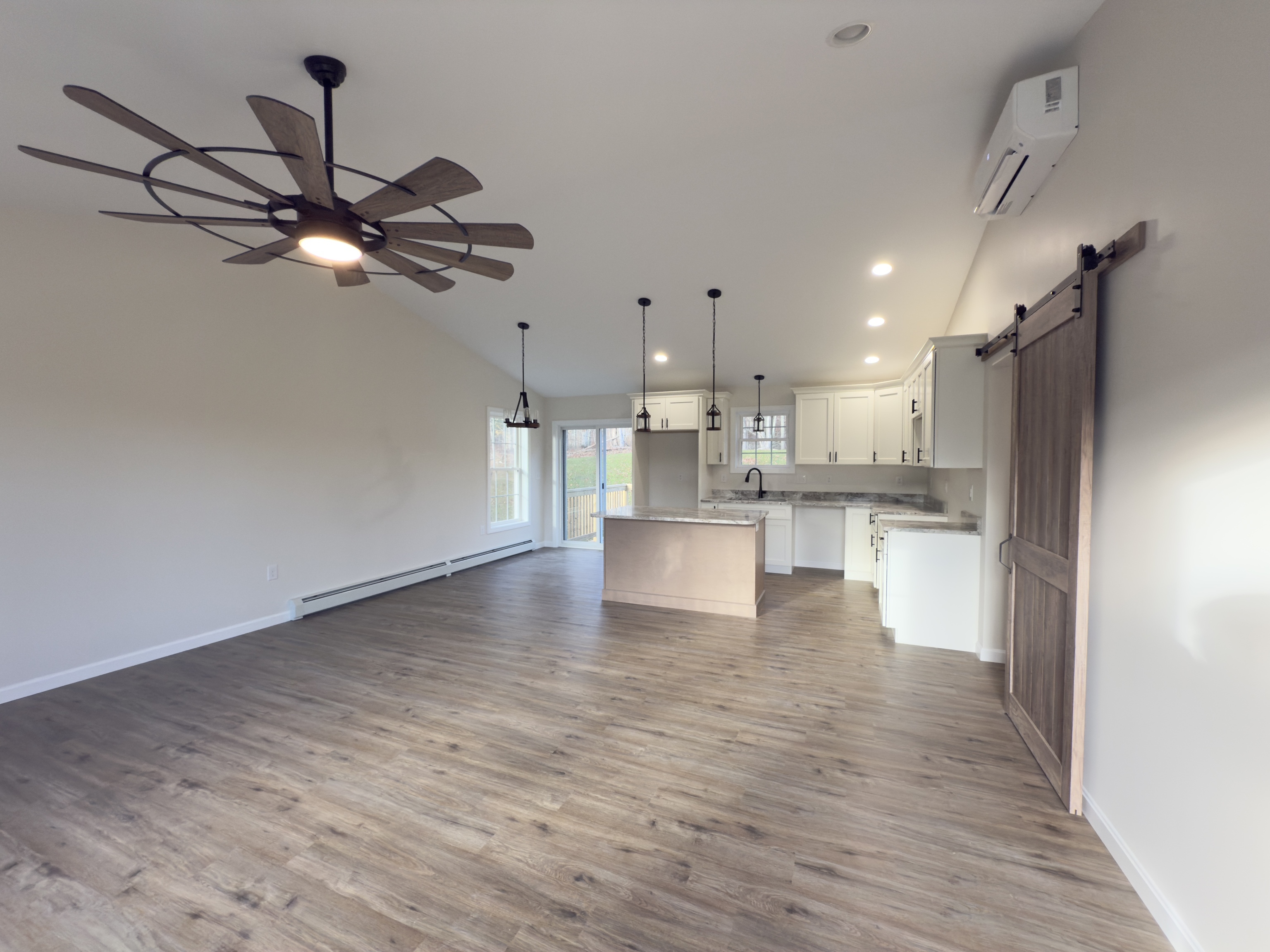 129 Snake Meadow Road Danielson, CT 06239 - Photo 3 of 5 a view of a kitchen with a sink stainless steel appliances and cabinets