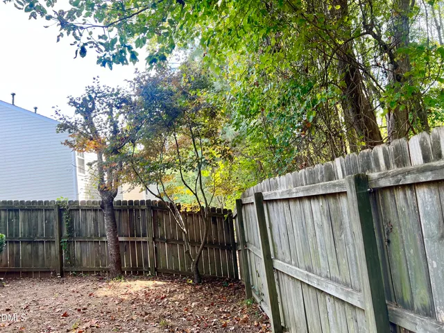 a view of a wooden fence