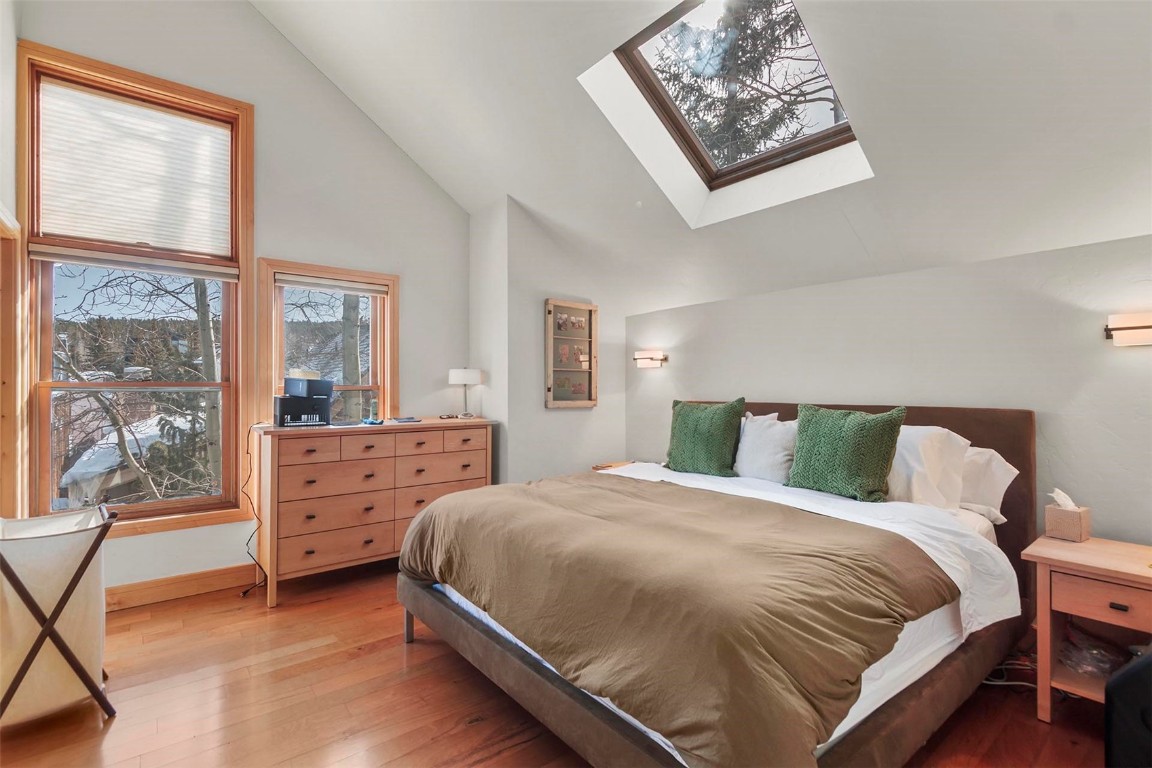 217 South Ridge Street, Unit 3 Breckenridge, CO 80424 - Photo 8 of 21 a bedroom with a bed and window