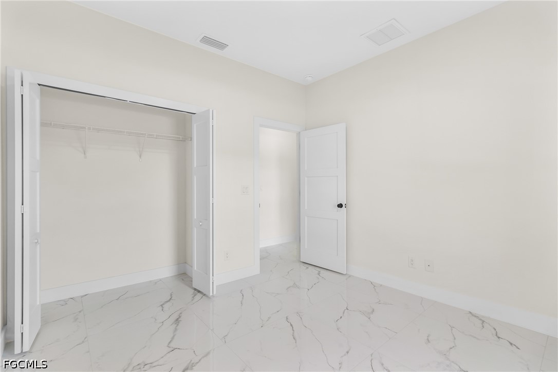 412 Fitch Avenue Lehigh Acres, FL 33972 - Photo 28 of 50 a view of an empty room