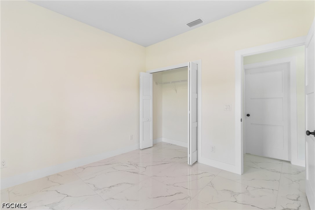 412 Fitch Avenue Lehigh Acres, FL 33972 - Photo 29 of 50 a view of an empty room