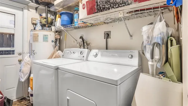 a utility room with a washer and dryer