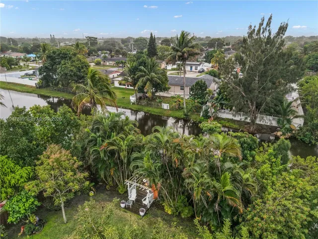 an aerial view of a house with garden