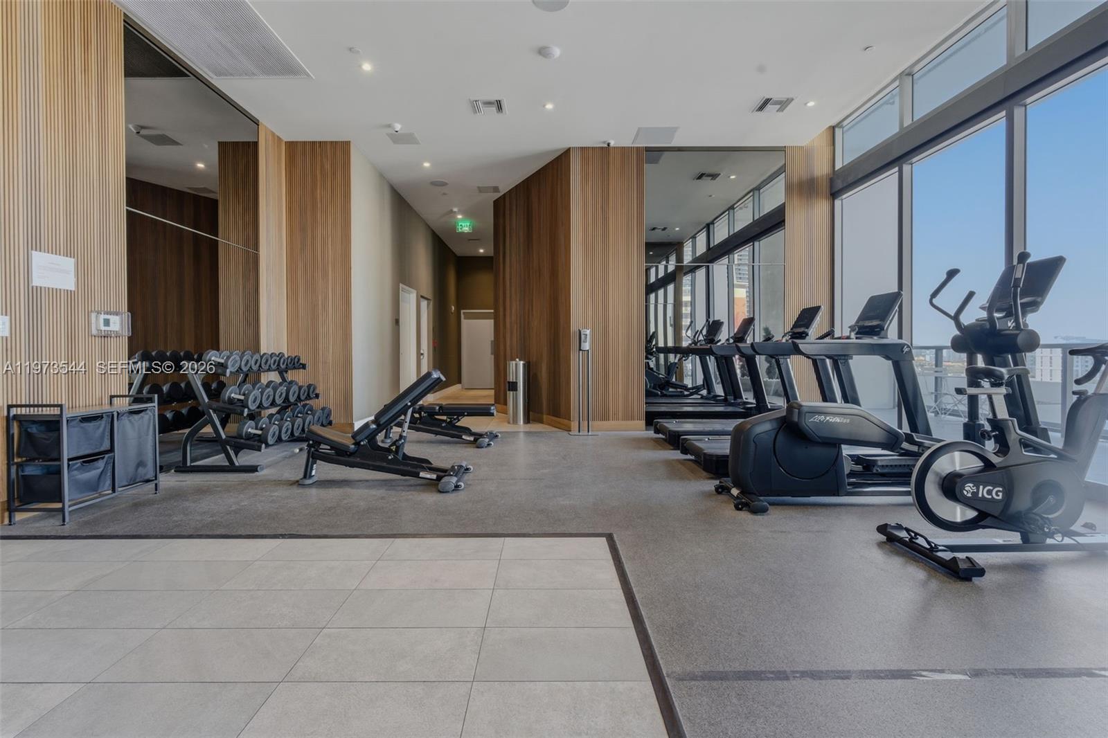 229 Southwest 9th Street, Unit 407 Miami, FL 33130 - Photo 13 of 29 a view of a room with gym equipment