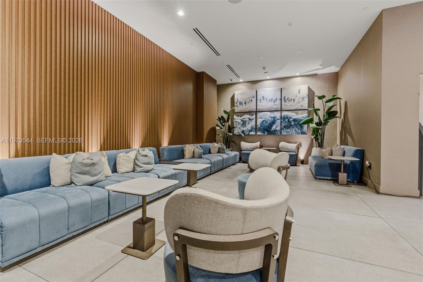 229 Southwest 9th Street, Unit 407 Miami, FL 33130 - Photo 8 of 29 a living room with furniture and a potted plant