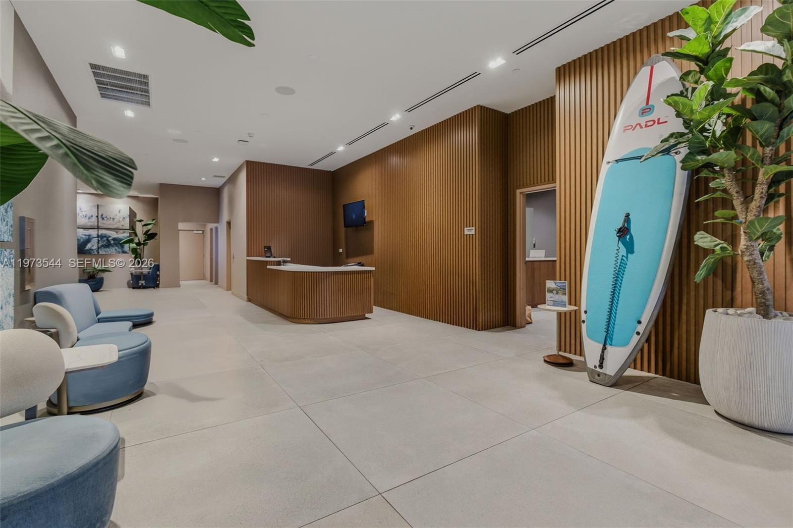 229 Southwest 9th Street, Unit 407 Miami, FL 33130 - Photo 9 of 29 a view of a livingroom with furniture and a potted plant