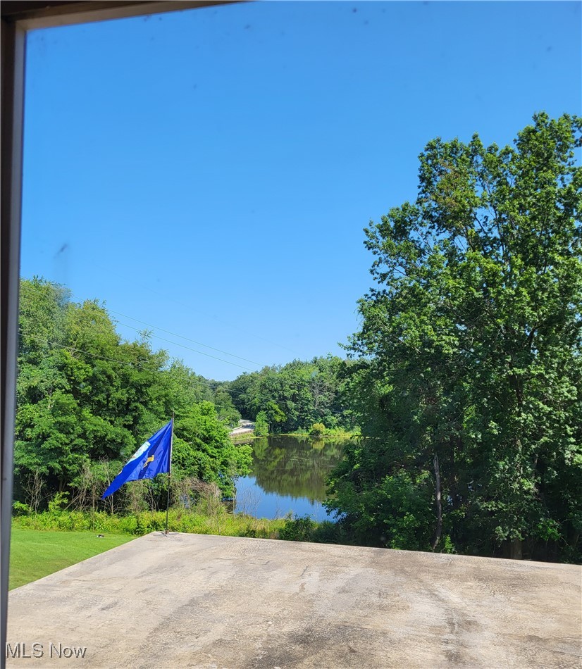 539 East Nimisila Road Uniontown, OH 44685 - Photo 4 of 41 View of patio / terrace with a water view
