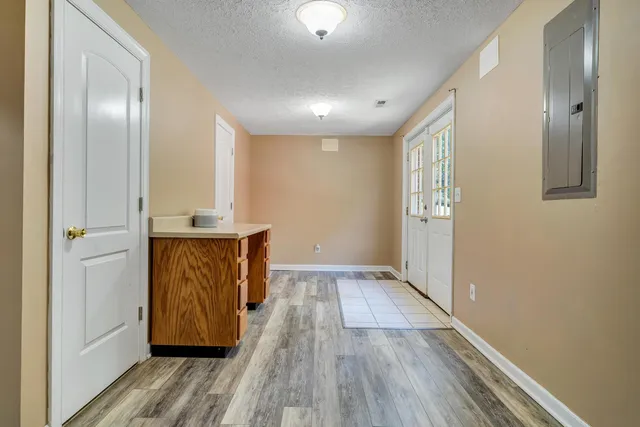 a a bathroom with a toilet and a shower curtain