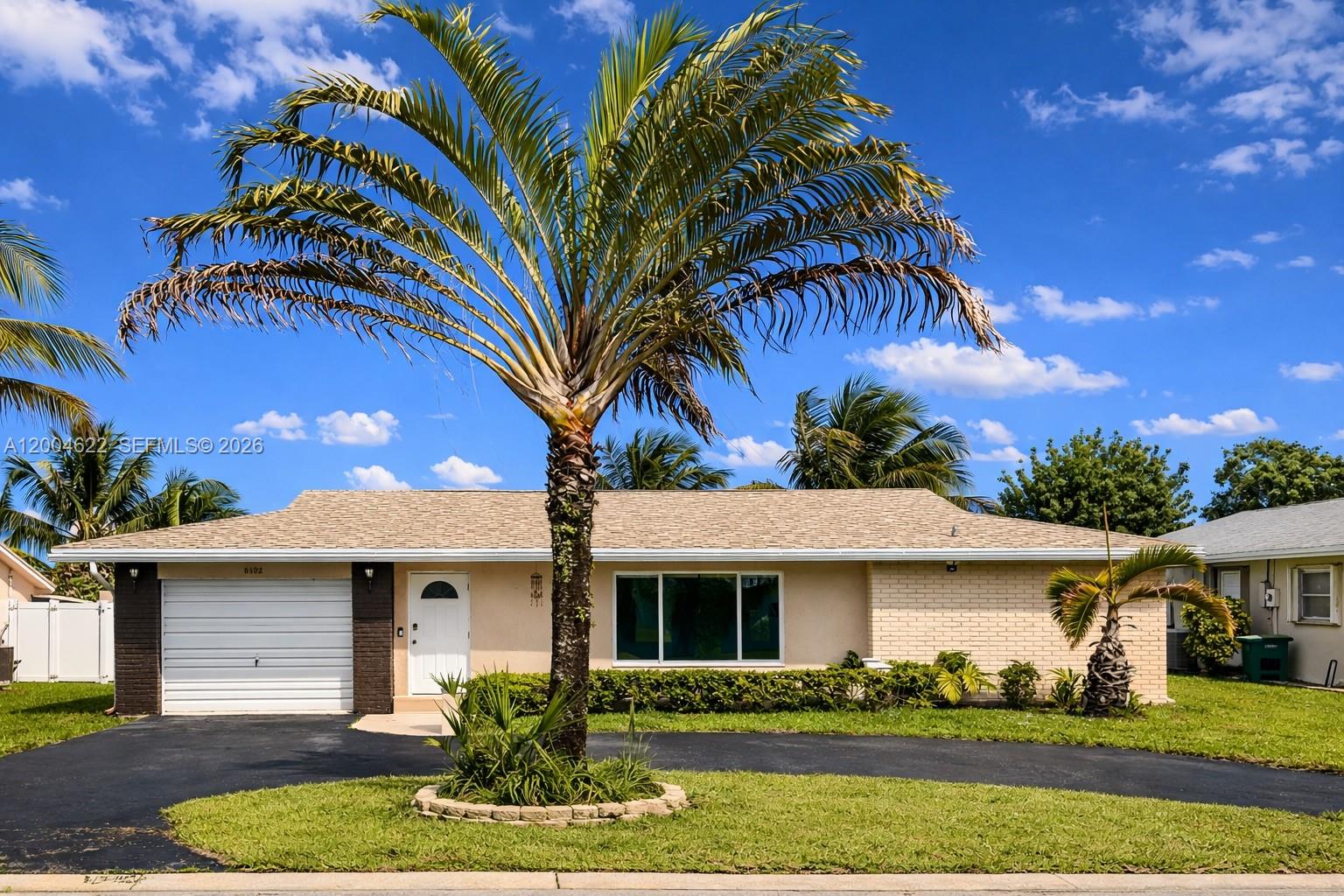 8102 Northwest 96th Terrace Tamarac, FL 33321 - Photo 1 of 51