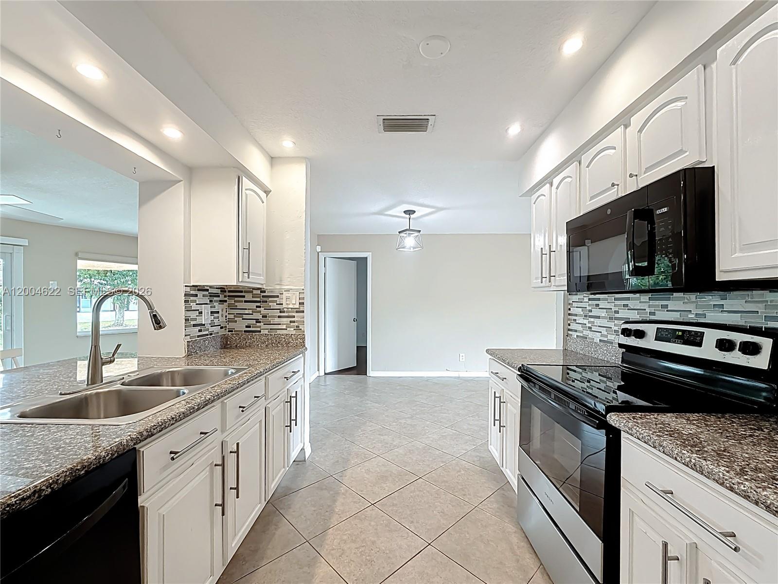 8102 Northwest 96th Terrace Tamarac, FL 33321 - Photo 19 of 51