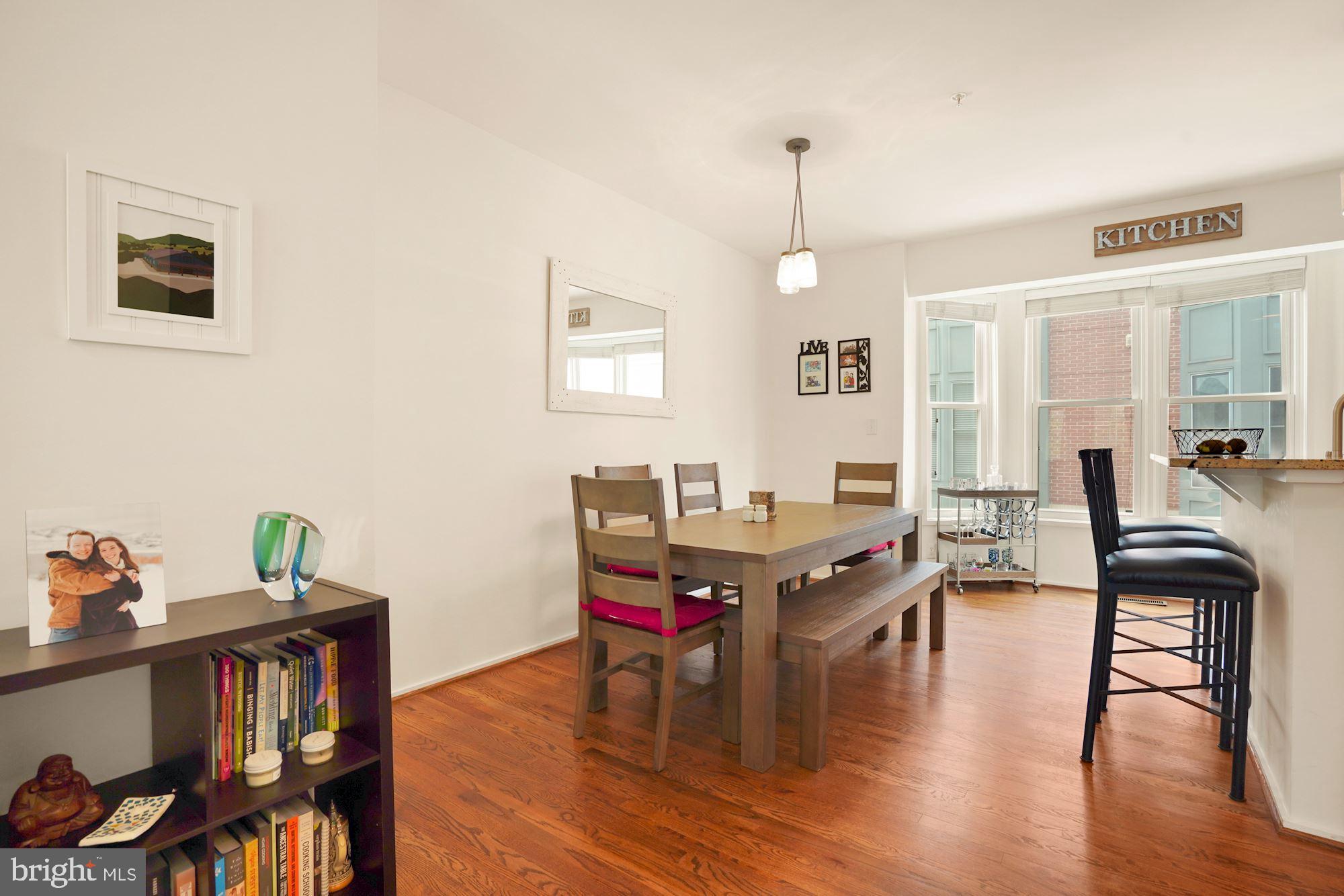1618 North Rhodes Street Arlington, VA 22209 - Photo 11 of 33 a living room with furniture and wooden floor