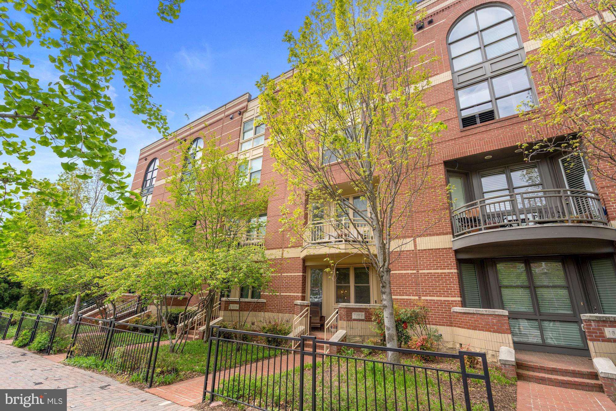 1618 North Rhodes Street Arlington, VA 22209 - Photo 3 of 33 a view of a building with a porch
