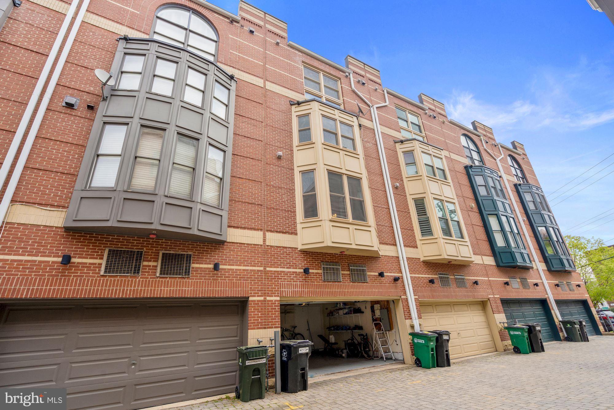 1618 North Rhodes Street Arlington, VA 22209 - Photo 32 of 33 a tall building with a lot of windows