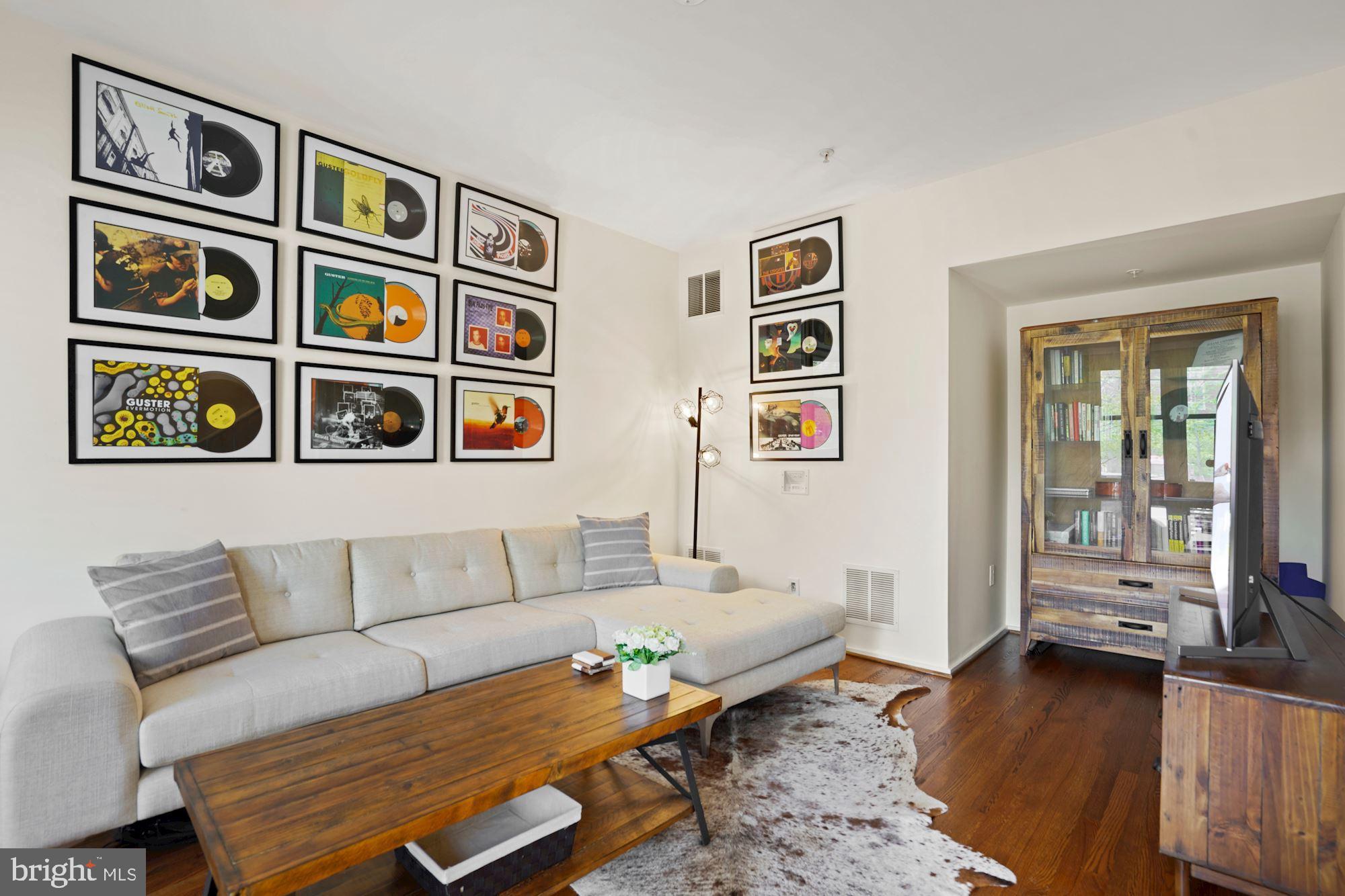 1618 North Rhodes Street Arlington, VA 22209 - Photo 4 of 33 a living room with furniture and next to a window