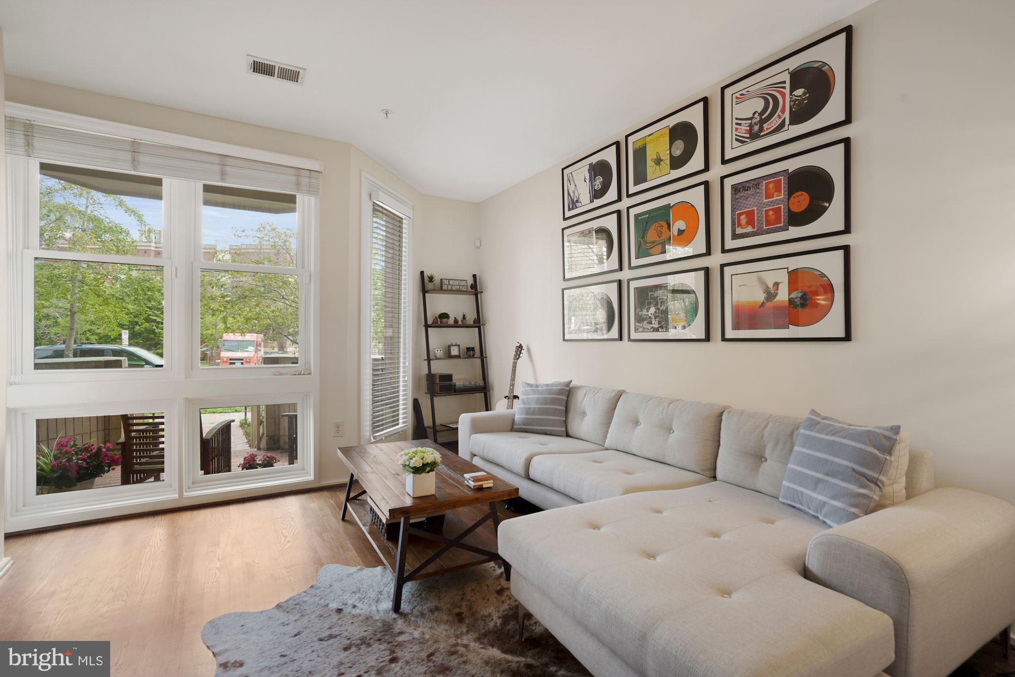 1618 North Rhodes Street Arlington, VA 22209 - Photo 5 of 33 a living room with furniture and large window
