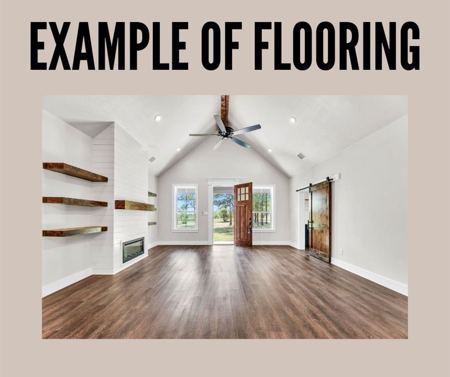 5 Slate Rock Road Ennis, TX 75119 - Photo 10 of 13 a view of a livingroom with wooden floor