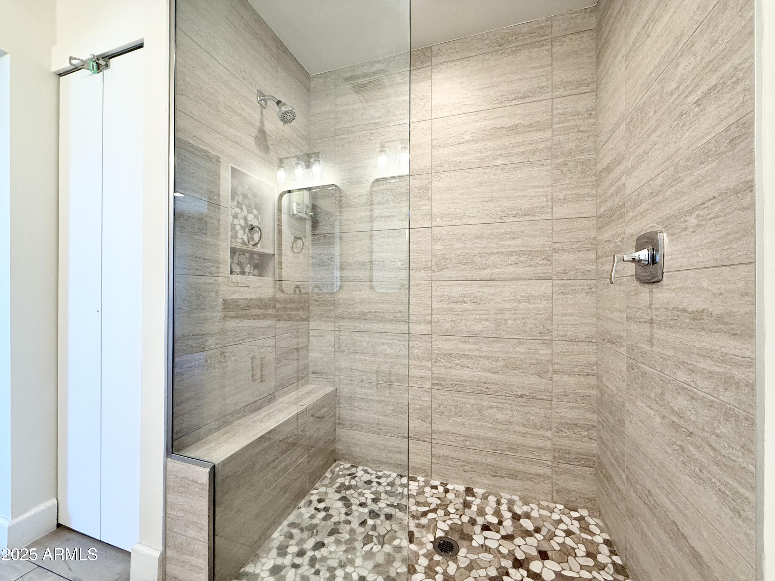 3625 North Hayden Road Scottsdale, AZ 85251 - Photo 18 of 24 a bathroom with a shower
