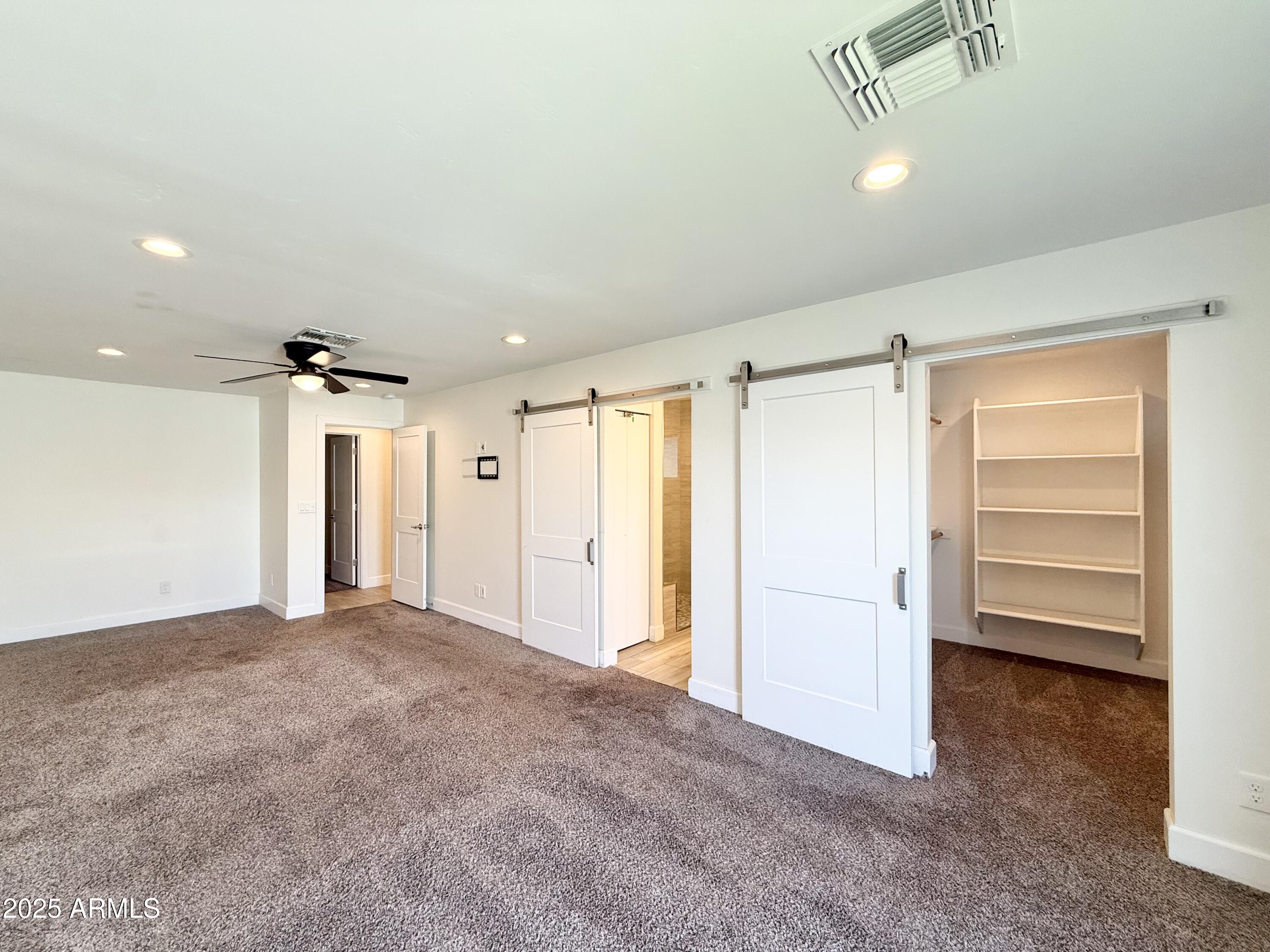3625 North Hayden Road Scottsdale, AZ 85251 - Photo 8 of 24 a view of empty room with closet and entryway