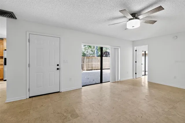 a view of a room with a large window
