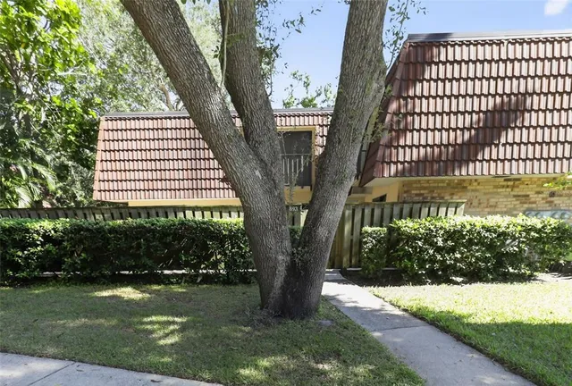 a view of a house with a wooden stairs