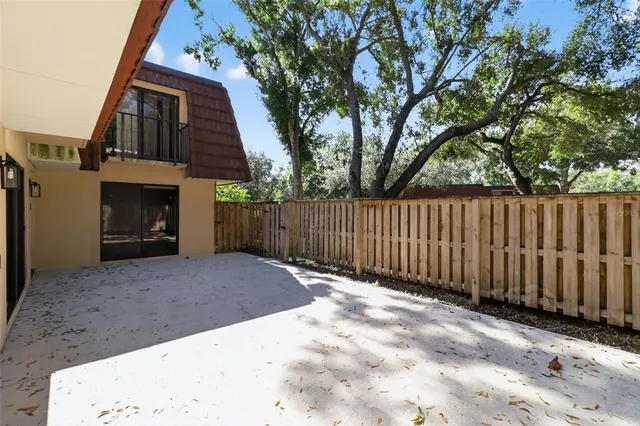 a kitchen with a sink and a refrigerator