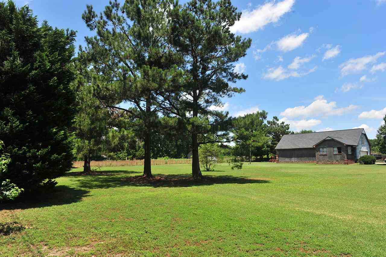 6909 Riley Hill Road Wendell, NC 27591 - Photo 1 of 12 View from Riley Hill Rd. Construction is not complete and will not be completed by seller. Home is sold as is. Roof replaced in 2011. Interior is a shell for buyer to design walls where they want. The Well is dug and ready for new owner to run plumbing. Exterior Front