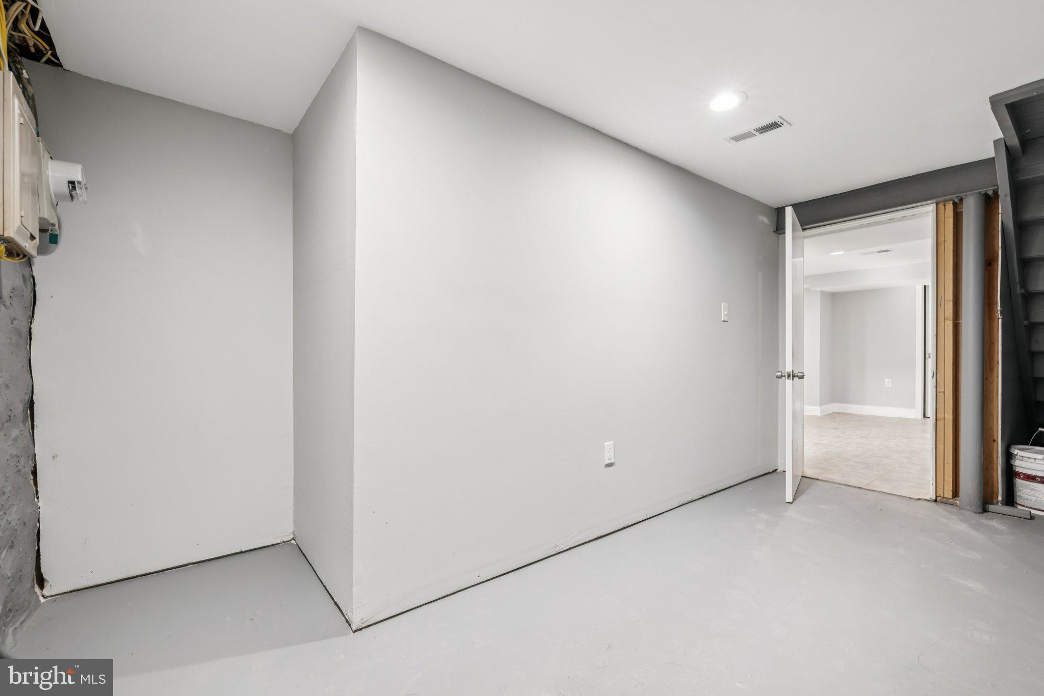 3427 Woodstock Avenue Baltimore, MD 21213 - Photo 23 of 46 a view of an empty room