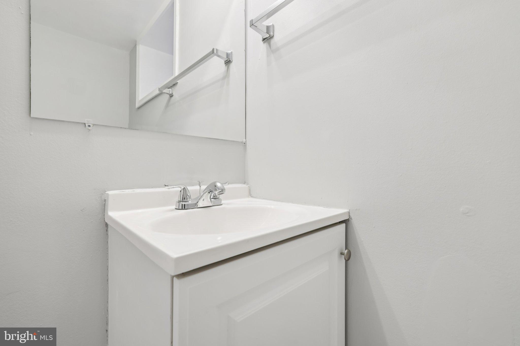 3427 Woodstock Avenue Baltimore, MD 21213 - Photo 30 of 46 a utility room with dryer and washer
