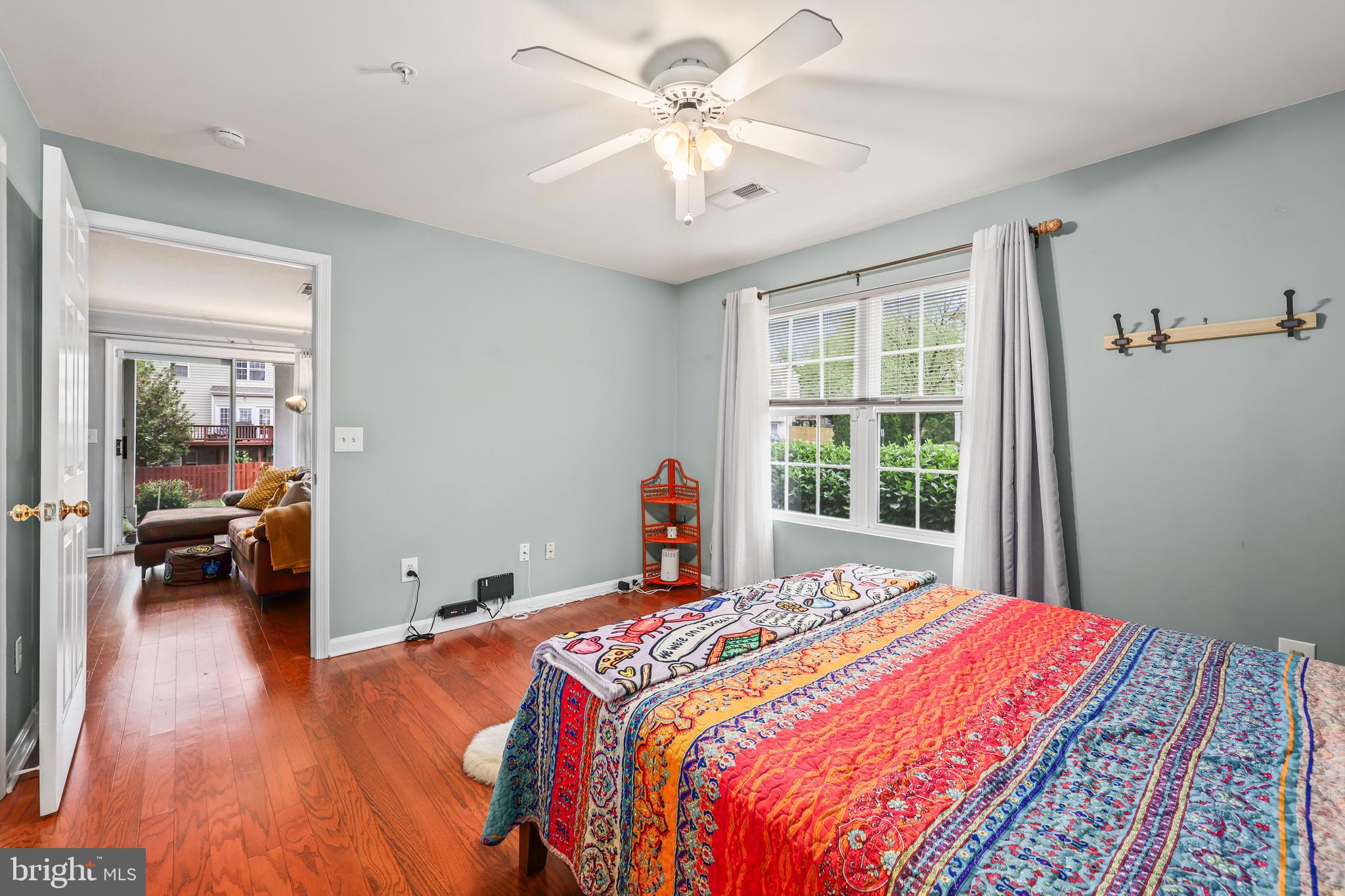 14197 Cuddy Loop, Unit 104 Woodbridge, VA 22193 - Photo 16 of 33 a bed sitting in a bedroom next to a window