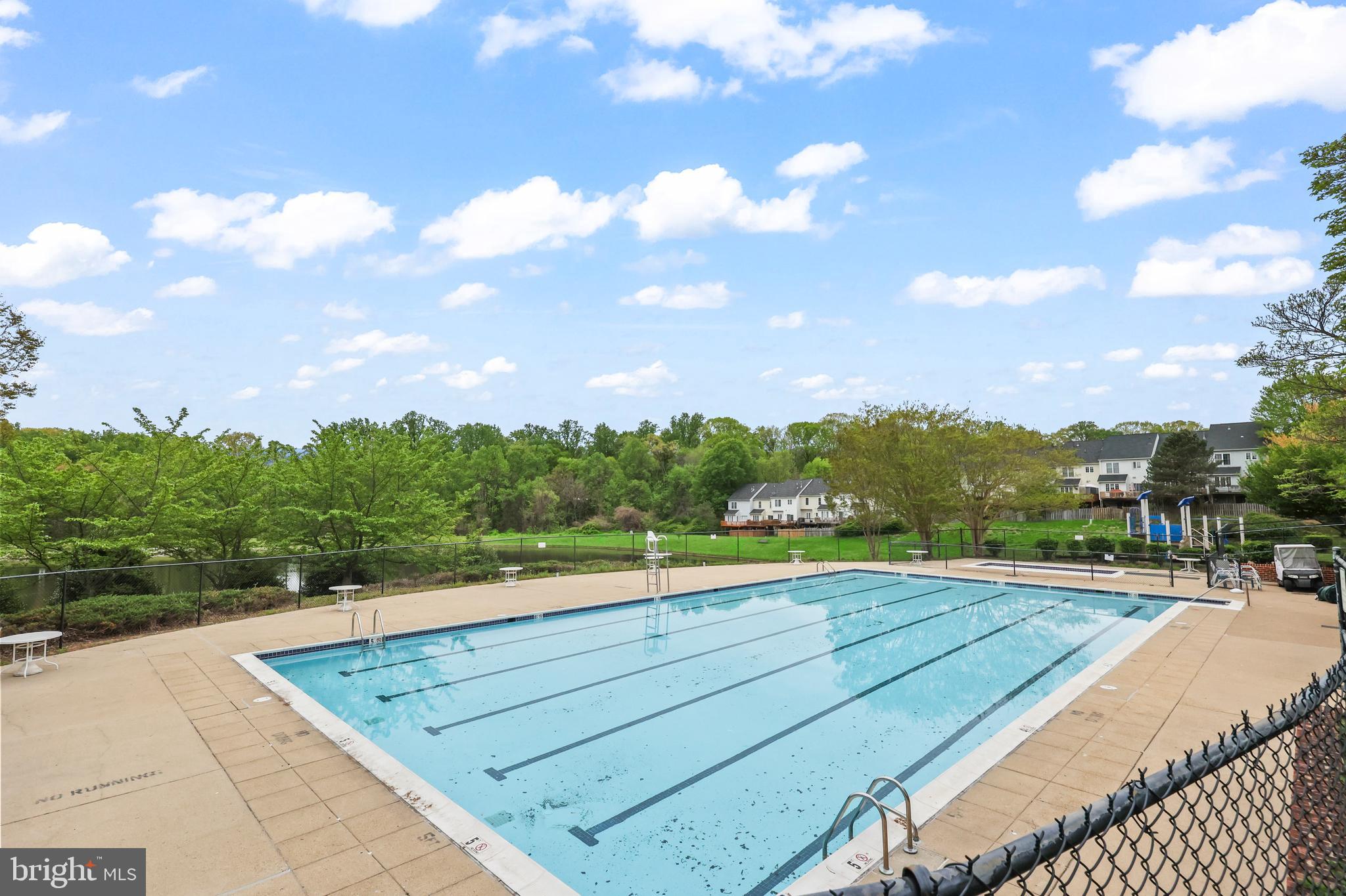 14197 Cuddy Loop, Unit 104 Woodbridge, VA 22193 - Photo 30 of 33 a view of an outdoor space and swimming pool